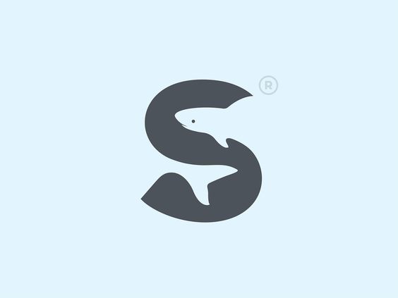 a logo with a shark and a letter s