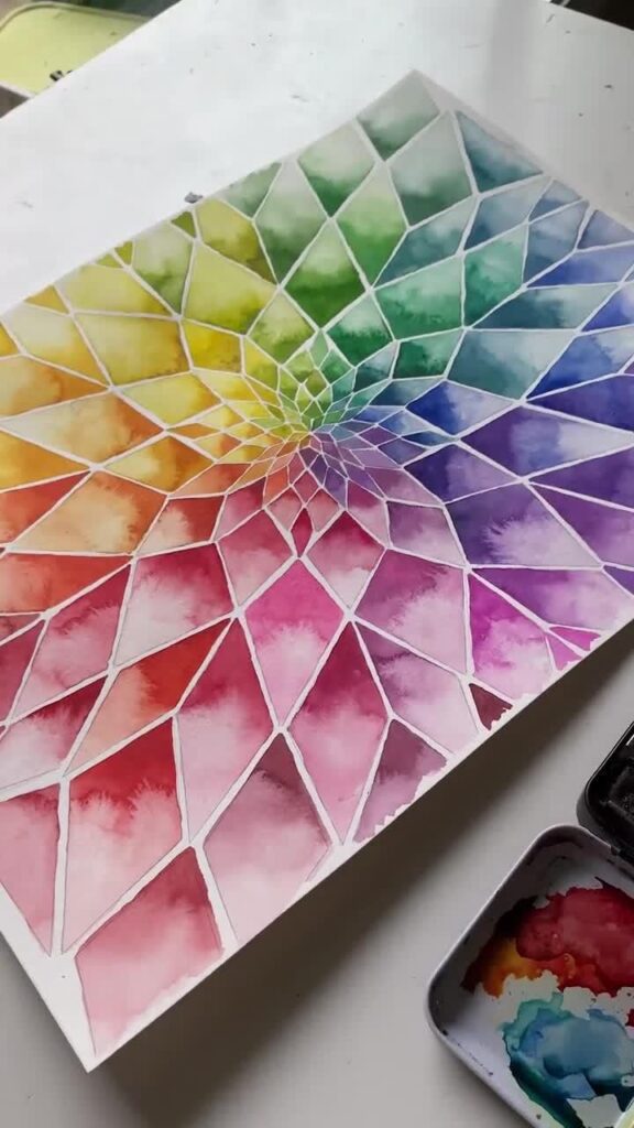 a painting of a rainbow colored diamond of watercolor