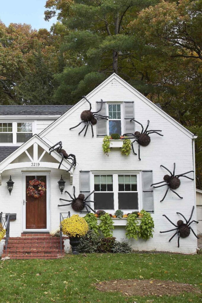 a house with spiders on the wall