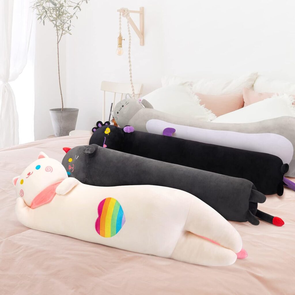 a group of stuffed animals on a bed