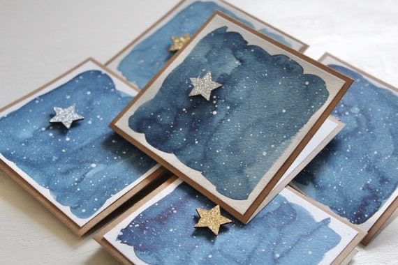 A set of blue cards with stars on them.