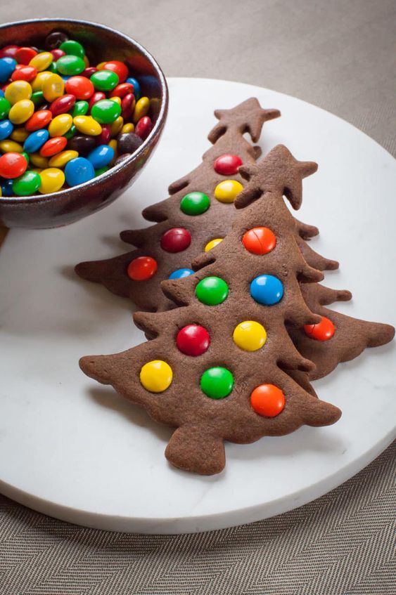 Chocolate christmas tree cookies with m & m's.