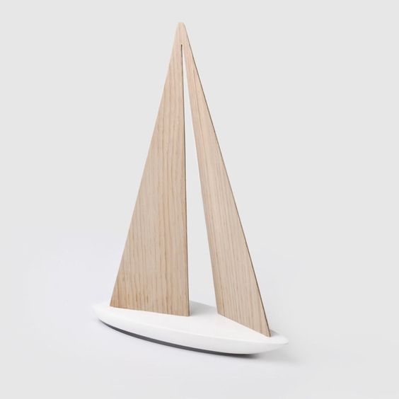 a wooden sailboat model