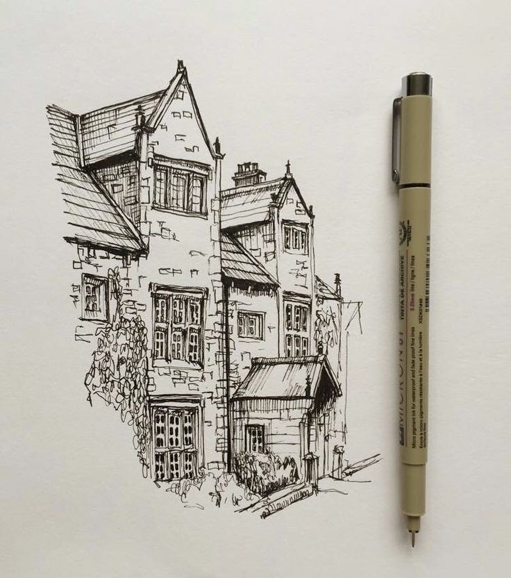a drawing of a house and a pen