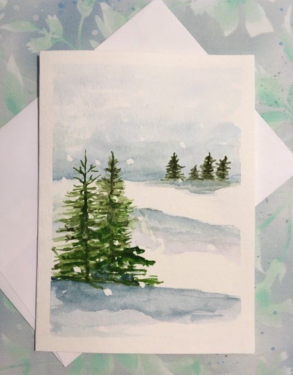 A watercolor painting of a snowy landscape with pine trees.
