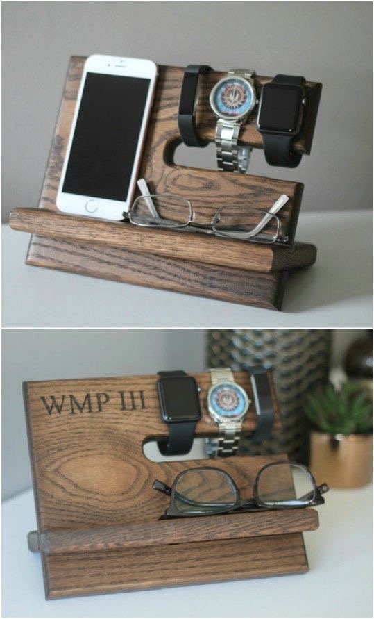 a wood stand with a phone and glasses