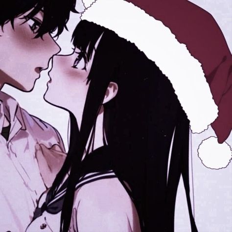 An anime couple kissing in a santa hat.