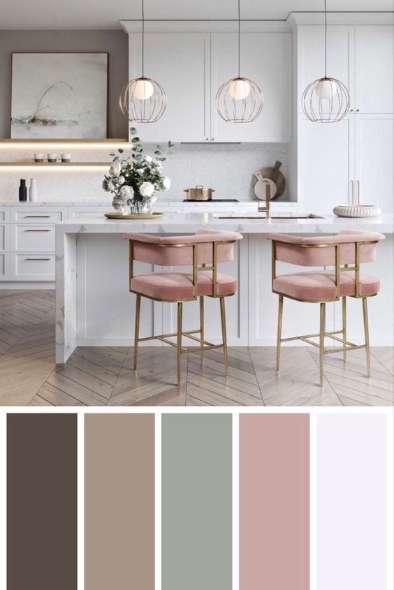 A kitchen with a pink and white color scheme.