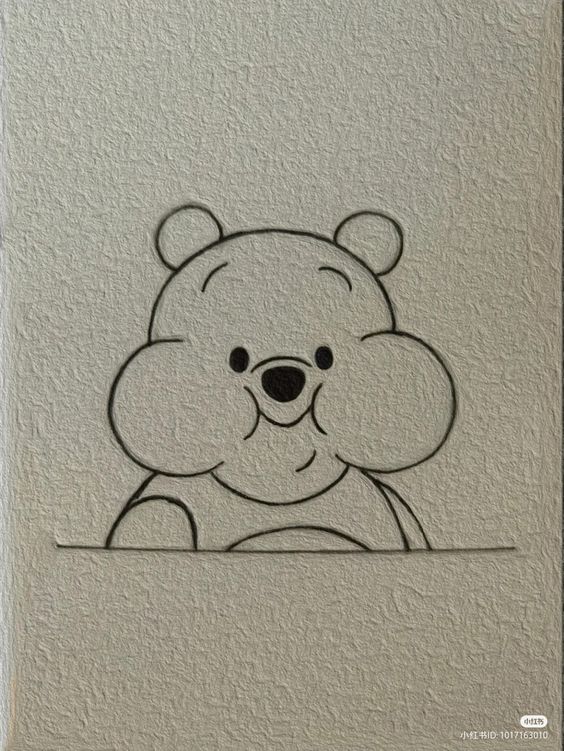 Black line drawing of winnie the pooh embossed on a textured beige surface, peering over an unseen edge.