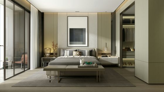 Modern bedroom with a large bed, beige walls, and an open walk-in closet, featuring a minimalistic design and natural light.
