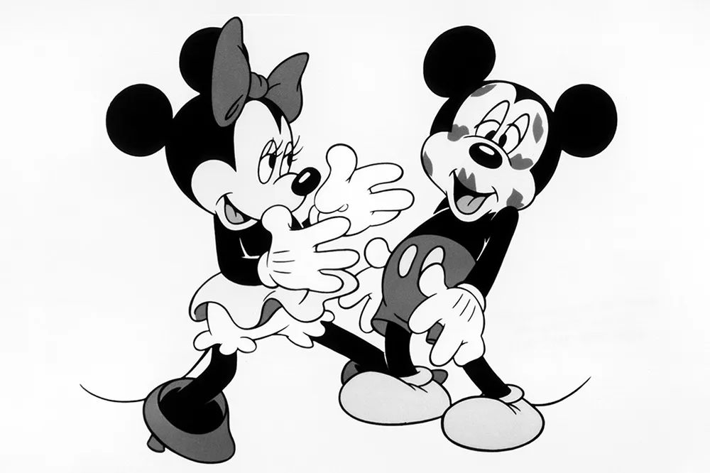 Vintage animated characters in black and white, with one character affectionately reaching out to the other.