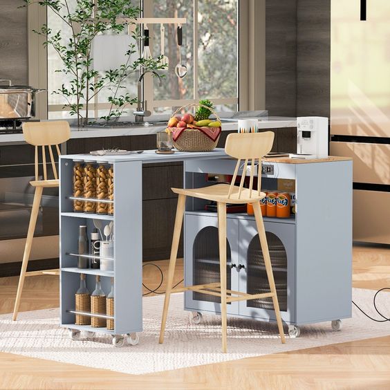 Modern kitchen island with shelves, stools, and fruit basket, providing a stylish and functional cooking space.