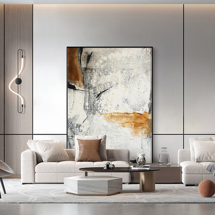 Modern living room with abstract art, neutral tones, grey sofas, and stylish decor for contemporary interior design inspiration.