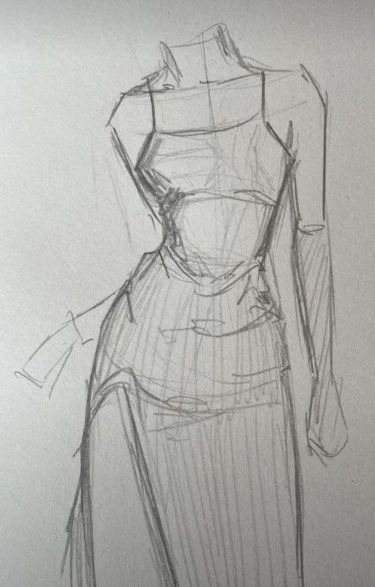 A rough pencil sketch of a female figure wearing a form-fitting dress with a high slit on one side. The figure lacks details such as a head, hands, and feet.