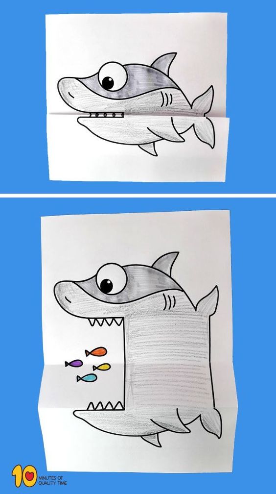 Creative folding paper art with shark drawing