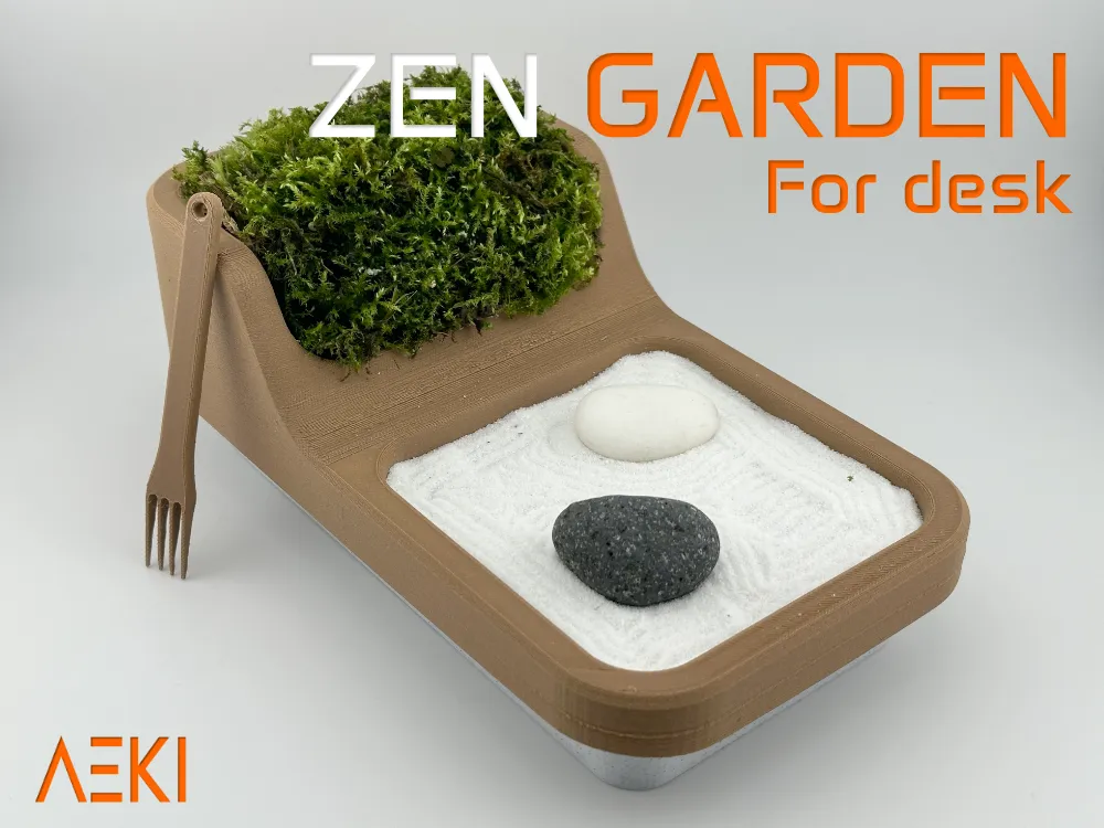 Compact desk Zen garden with moss, sand, and stones, designed for relaxation and stress relief at work. Brand: AEKI.