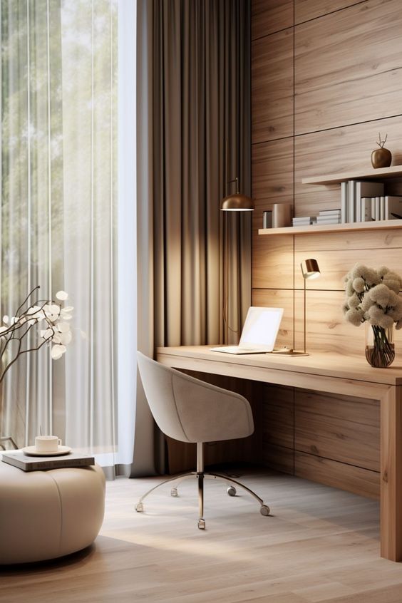 Minimalist home office with wooden desk, beige chair, laptop, elegant lamp, and large window for natural light. Modern workspace design.