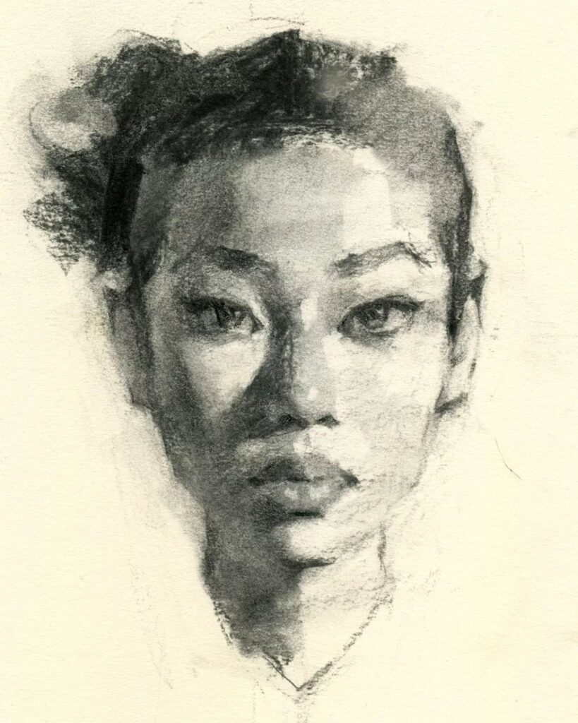 Charcoal sketch of a person's face with detailed eyes and expressive features on a light background.