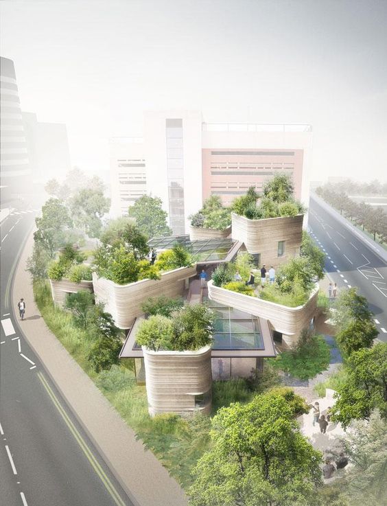 Futuristic eco-friendly building with green rooftops and organic design, surrounded by roads and neighboring structures.