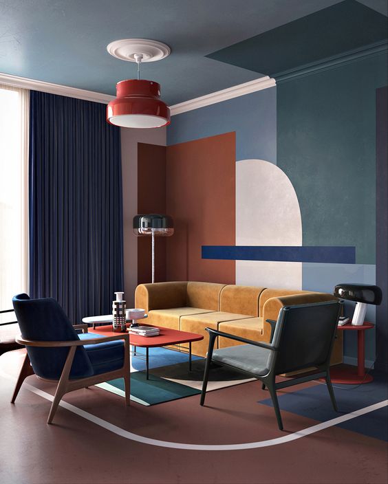 Modern living room with geometric wall art, blue and tan furniture, red lighting, and contemporary decor.