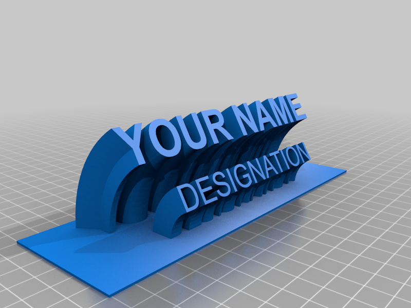 3D printed name plate with Your Name and Designation text in blue, displayed on a grid surface.