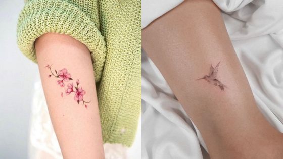Minimalist tattoos: pink floral tattoo on an arm with a green sweater and a small hummingbird tattoo on an arm with white sheets.