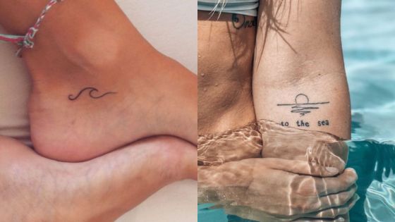 Minimalist ocean-inspired tattoos: a wave on an ankle, and a sunset with to the sea text on an arm, partially submerged in water.