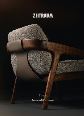 Modern grey armchair with wooden frame by Zeitraum, featured in a sustainability report.