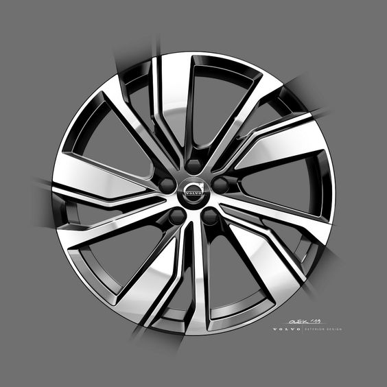 Sleek and modern Volvo alloy wheel rim design in silver and black, showcasing intricate geometric patterns and premium finish.