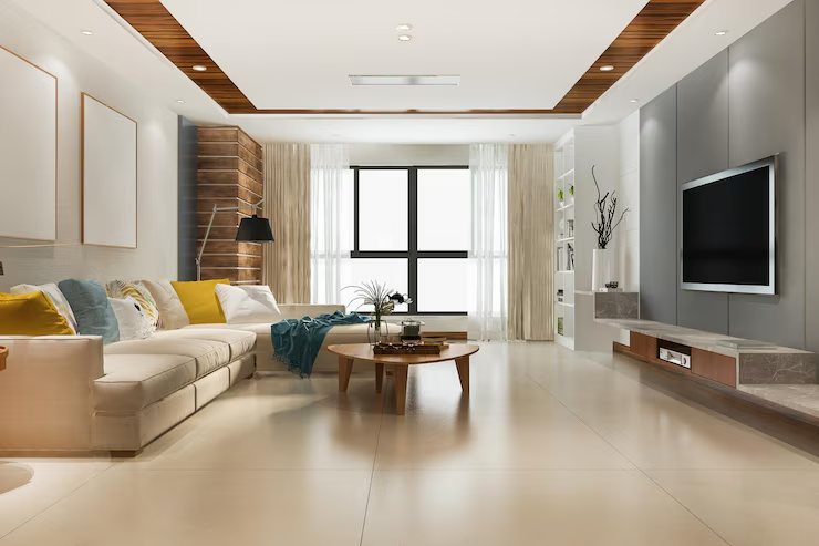 Modern living room with large window, beige sectional sofa, yellow cushions, wooden coffee table, and wall-mounted TV.