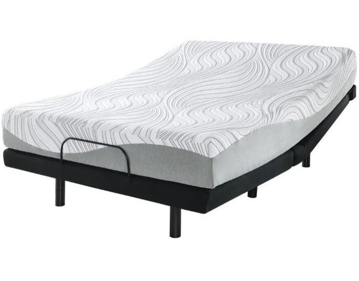 Adjustable bed with ergonomic mattress and modern wave pattern on white cover, ideal for comfort and support.