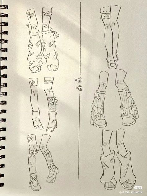 Sketch of various creative legwear designs on a notebook page, showcasing different sock and shoe styles.