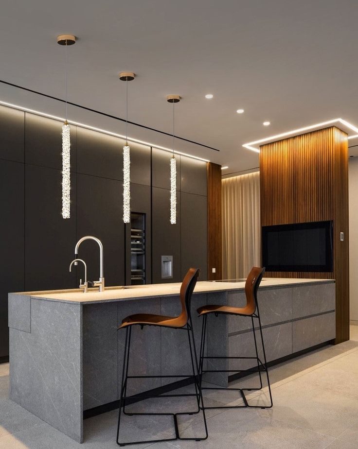 Modern kitchen with island, pendant lights, dark cabinets, wood accents, and sleek bar stools. Minimalistic and elegant design.