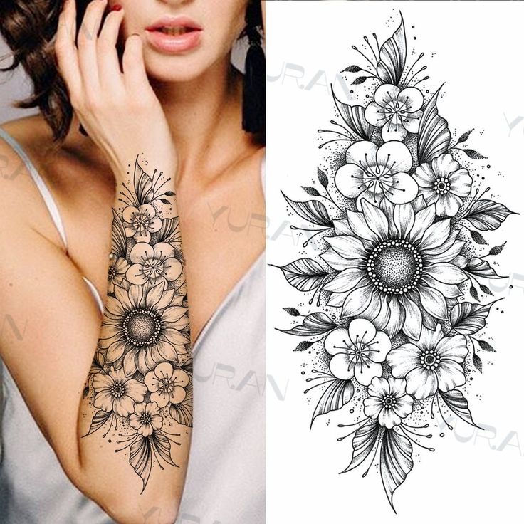 Forearm floral tattoo design with intricate blossoms and leaves in black ink, showcasing detailed artistic work.