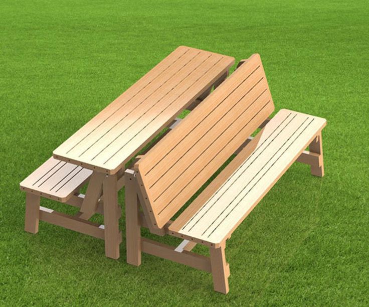 Convertible picnic table and bench made of wood on green grass, perfect for outdoor seating and dining.