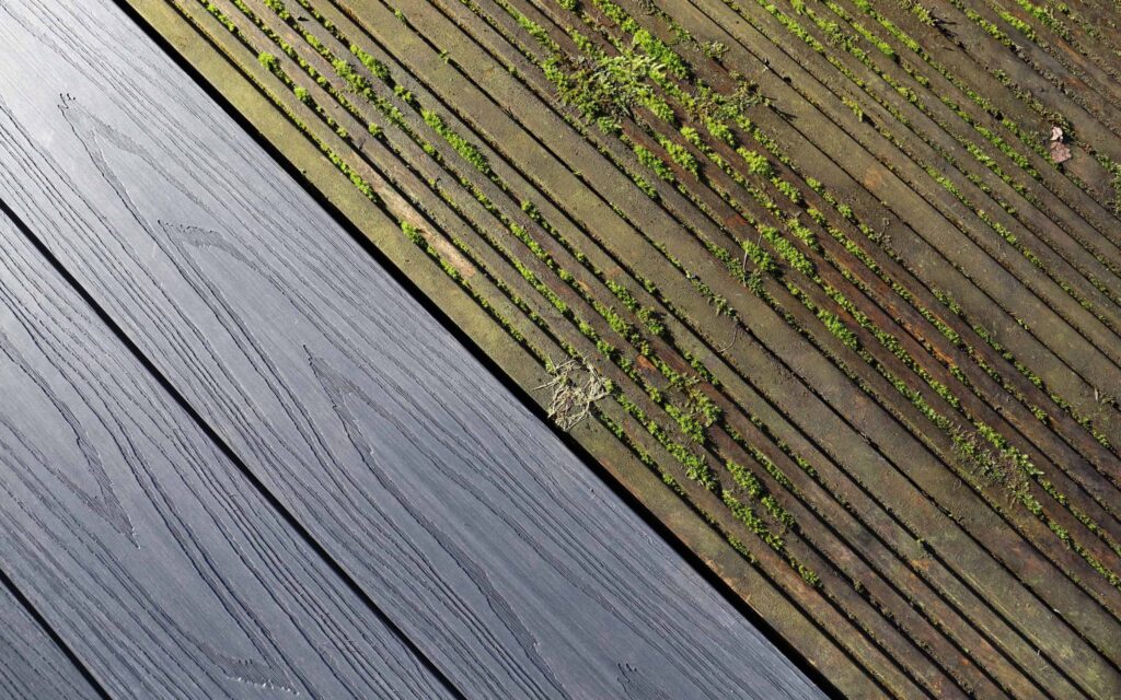 Comparison of clean and dirty decking boards, with one side covered in moss and the other side new and clean.