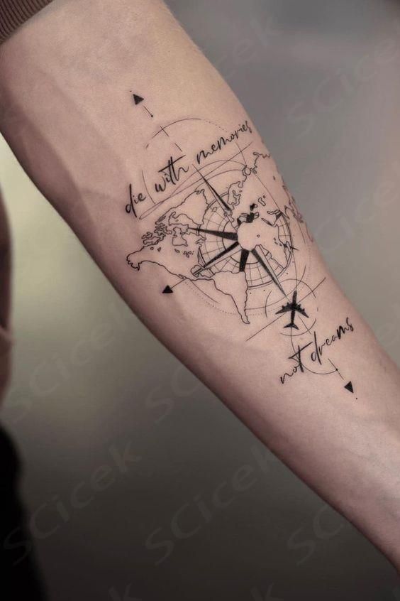 Forearm tattoo of a world map with a compass and airplane, featuring the text die with memories, not dreams.