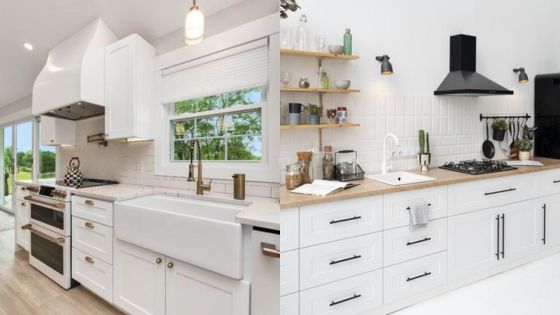 Modern white kitchen with sleek countertops, farmhouse sink, and stainless steel appliances, offering a bright and open atmosphere.