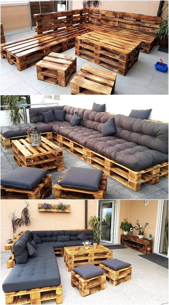 DIY outdoor furniture made from wooden pallets. Cushioned seating set on a patio, featuring tables and stools.