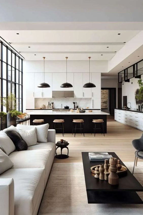 Modern kitchen and living room with black and white decor, large windows, wooden accents, and minimalistic design.