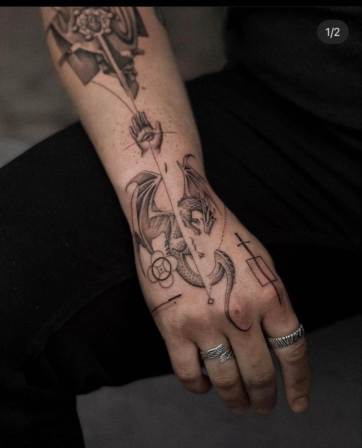 _ 14 Intricate dragon tattoo on hand with geometric and abstract elements, showcasing detailed artistry and design creativity. | Sky Rye Design Intricate dragon tattoo on hand with geometric and abstract elements, showcasing detailed artistry and design creativity.