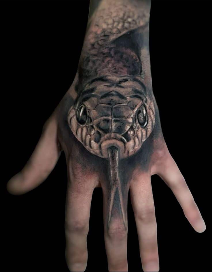 _ 3 Realistic snake tattoo on hand, featuring detailed scales and eyes, creating a lifelike reptilian appearance against a black background. | Sky Rye Design Realistic snake tattoo on hand, featuring detailed scales and eyes, creating a lifelike reptilian appearance against a black background.