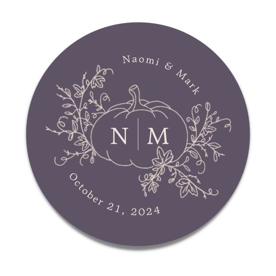 Wedding monogram design with a pumpkin and floral motif, featuring initials N and M, and date October 21, 2024.