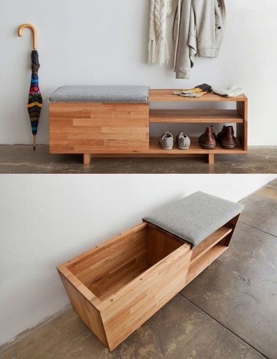 Multifunctional wooden bench with shoe storage, cushion seat, and lift-top compartment. Coats and umbrella hang above.