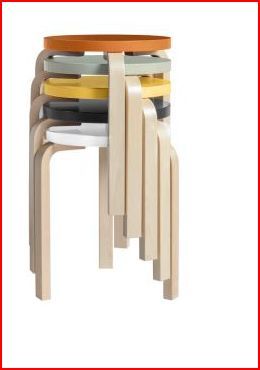 Stacked colorful wooden stools with curved legs, modern design furniture, ideal for home or office seating solutions.