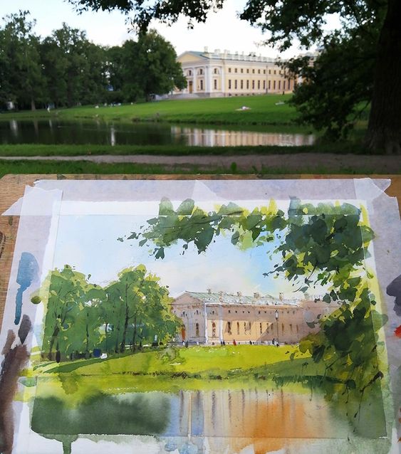 Watercolor painting of a historic building and lush landscape, depicted in front of the actual scene with a pond and trees.