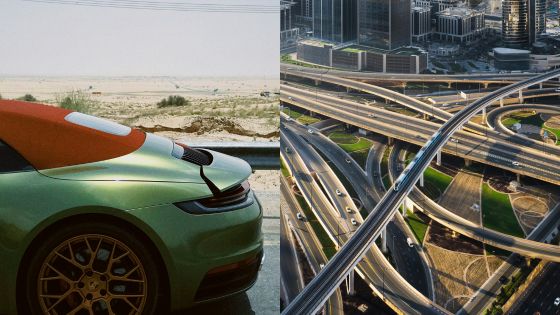 Porsche parked in the desert alongside an intricate city highway interchange, showcasing a contrast between nature and urbanization.