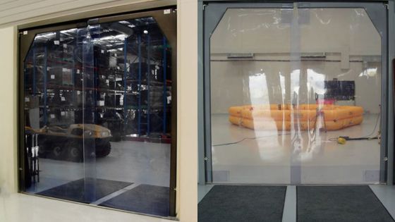 Clear PVC strip curtains separate a warehouse area with shelves (left) from cleanroom equipment (right), ensuring safety and efficiency.