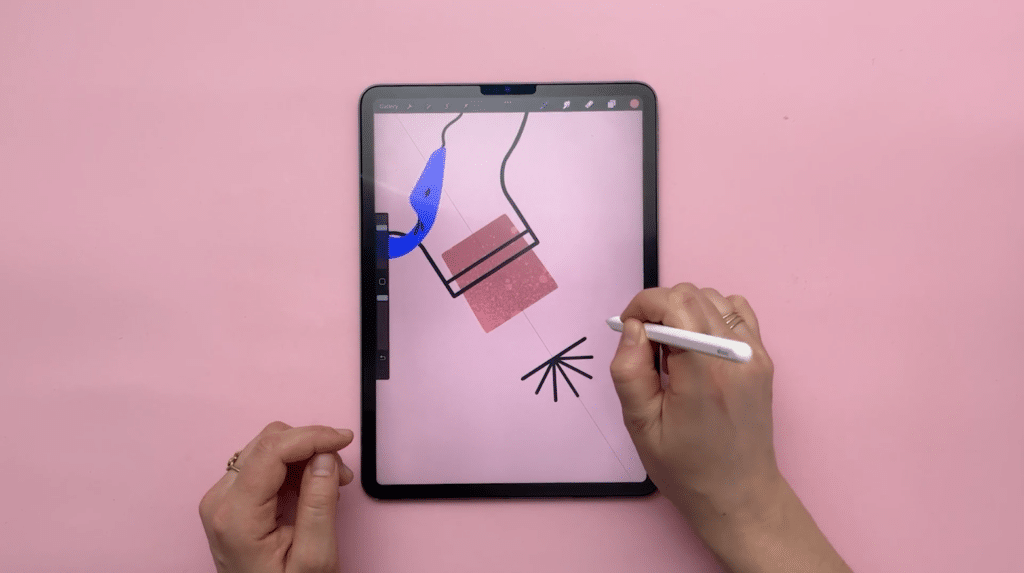 Digital drawing on a tablet with a stylus against a pink background, showcasing graphic design tools and techniques.