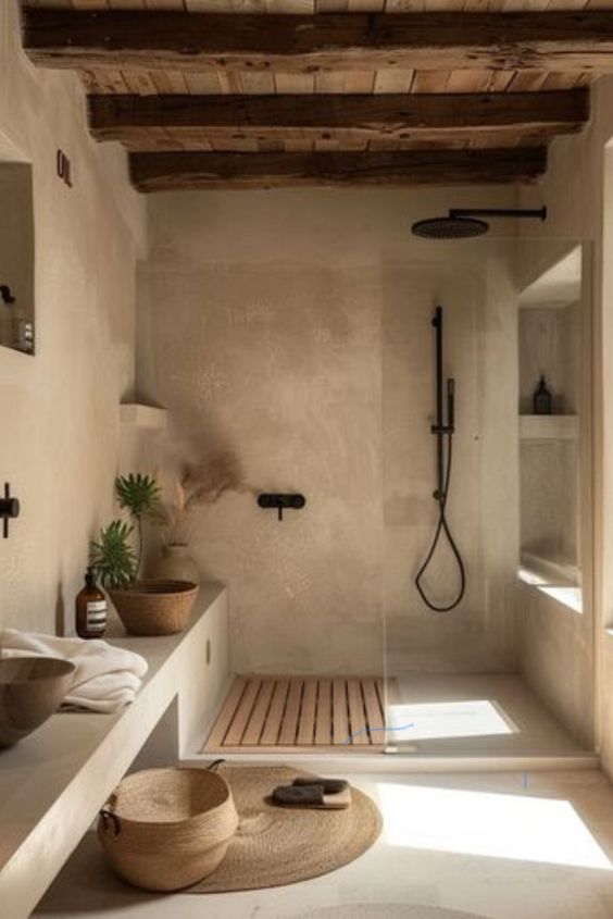 Rustic bathroom with wooden ceiling, stone shower, natural decor, and soft lighting. Cozy, minimalist interior design.